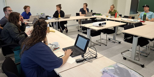Disserationskolloqium. Die Promovierenden diskutieren