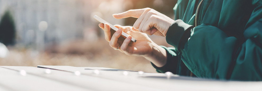Smartphone A person types in something on a smartphone